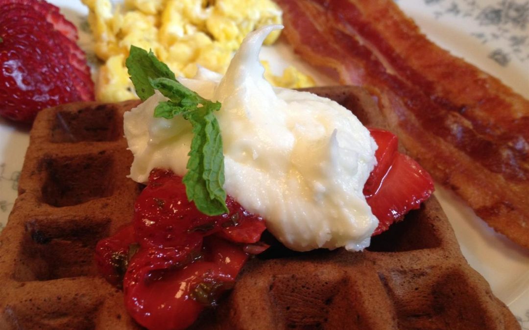 Waffles, Creme Fresh, Local Strawberries, Scrambled Eggs, & Bacon